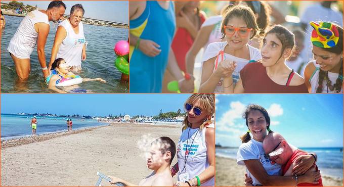 Sorrisi e solidarietà a Ostia, disabili in spiaggia accompagnati dai clown