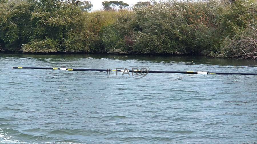 Durante la piena si apre la barriera anti-rifiuti sul Tevere: ecco perché