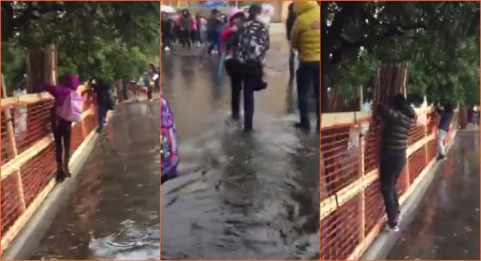 Fiumicino, cortili come piscine: studenti costretti a camminare in bilico sulle travi
