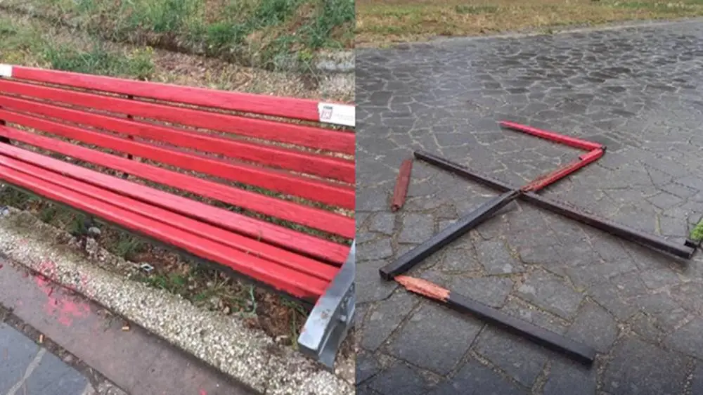 Roma, Parco della Pace: panchina rossa distrutta e “trasformata” in una svastica